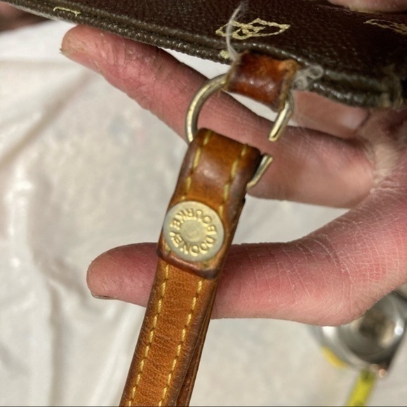 Dooney & Bourke brown vintage wristlet bag